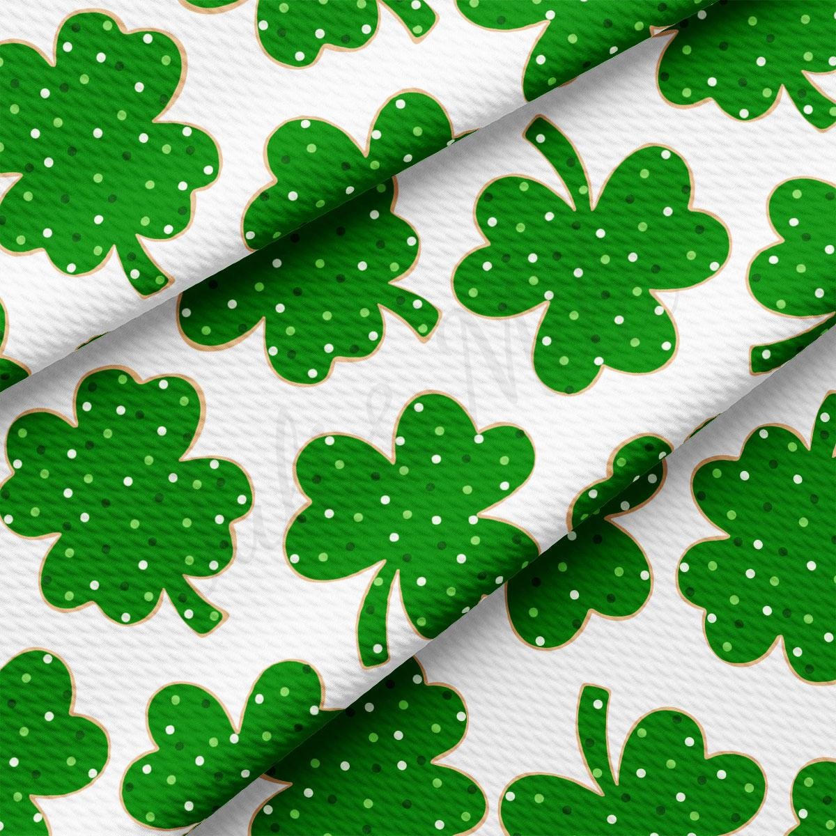 a green shamrock pattern on a white background