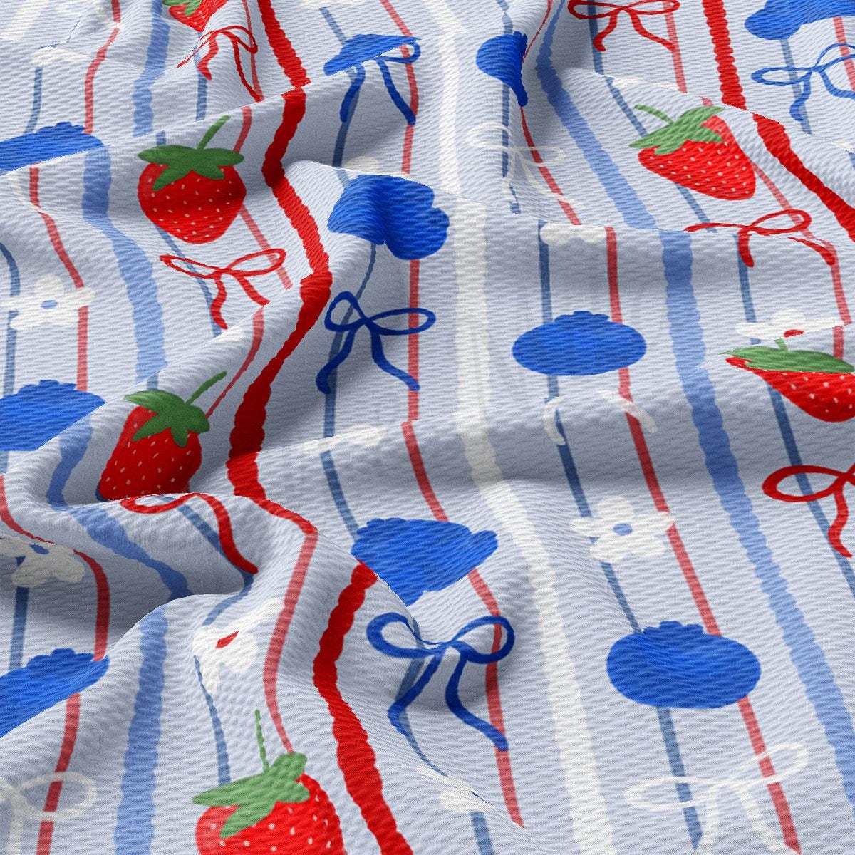 a red, white, and blue striped fabric with strawberries on it