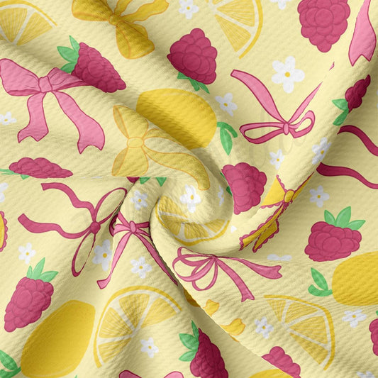 a close up of a yellow and pink fabric