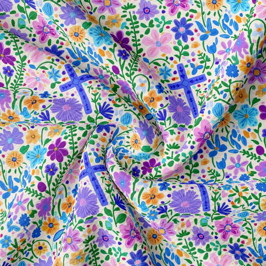 a colorful fabric with flowers and crosses on it