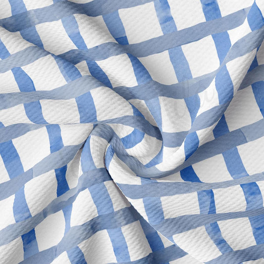 a blue and white checkered fabric is shown