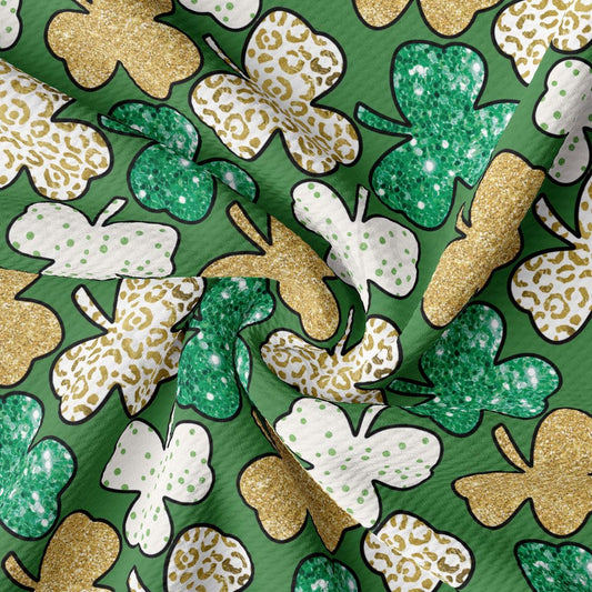 a green and gold shamrock print fabric