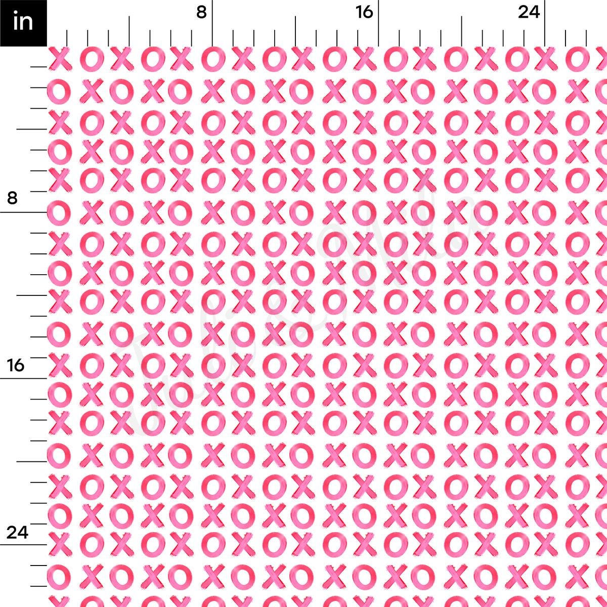 a ruler with a pink pattern on it