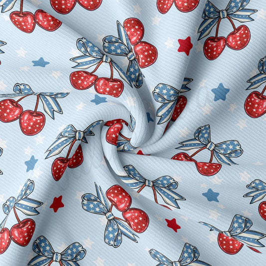 a blue background with red, white and blue cherries