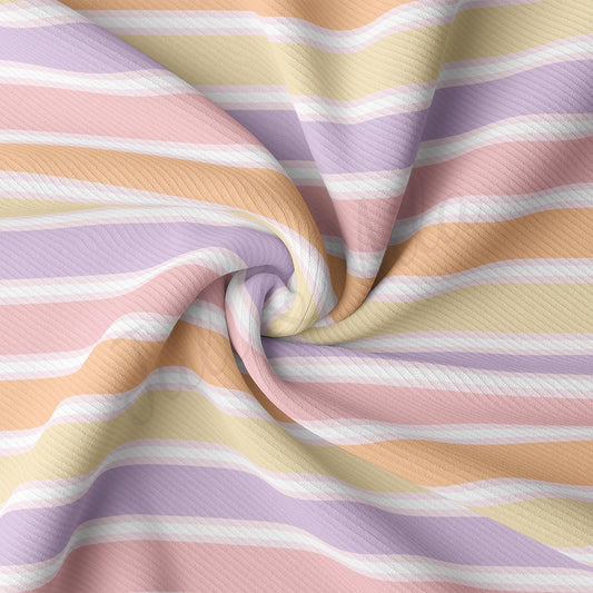 a pink, yellow, and purple striped fabric