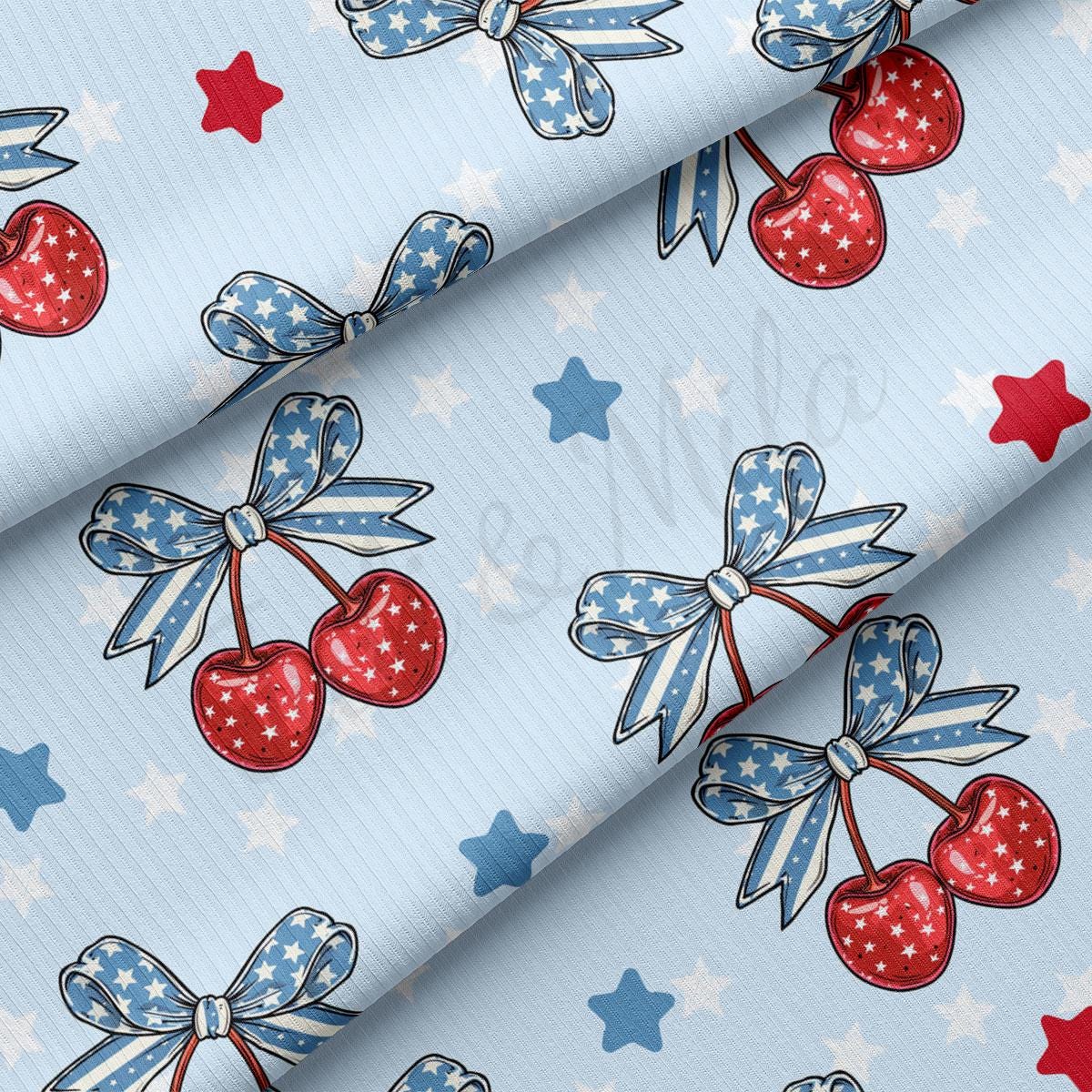 a pattern of cherries and stars on a blue background