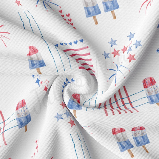 a white fabric with red, white, and blue designs