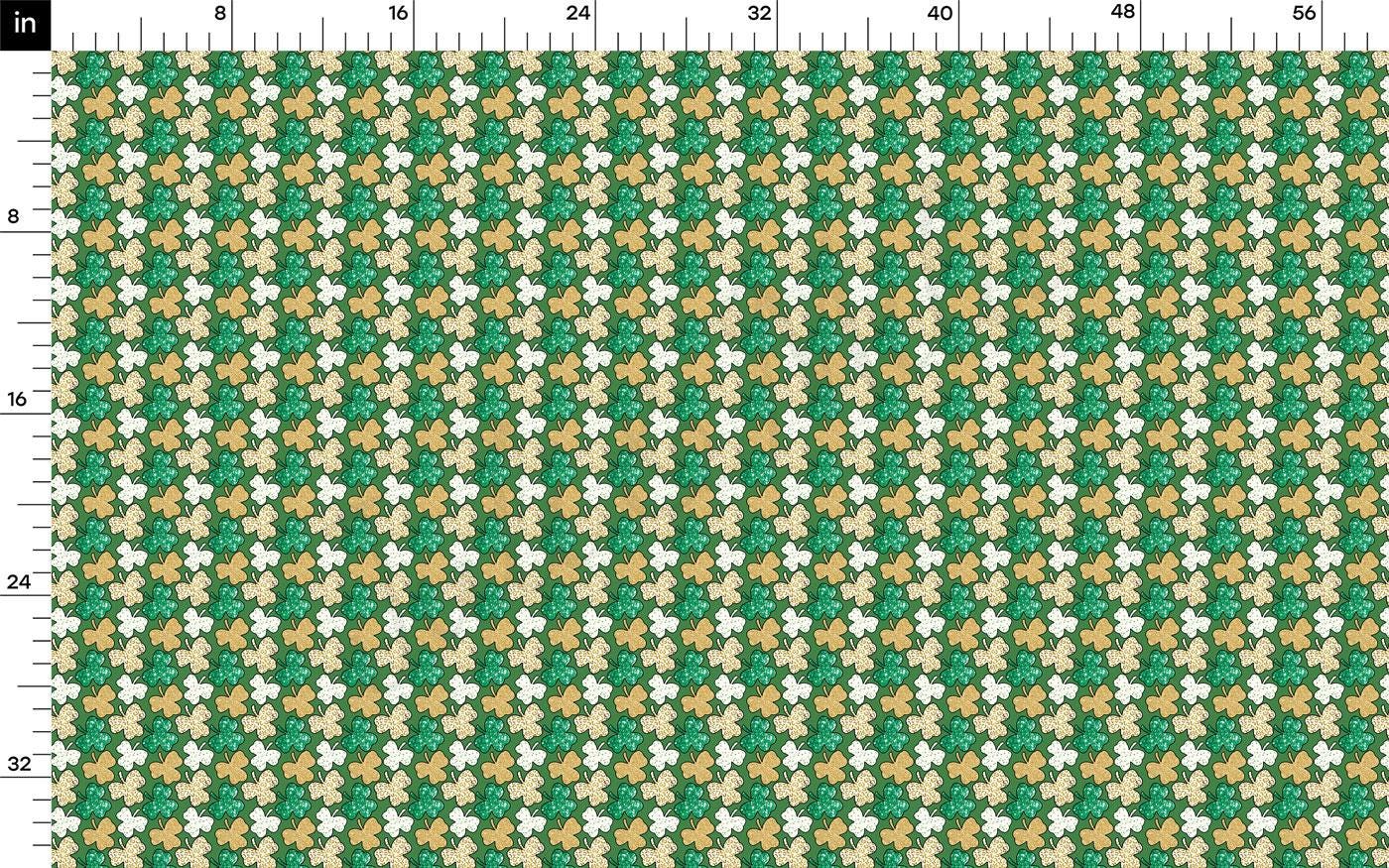 a green and gold pattern with a ruler