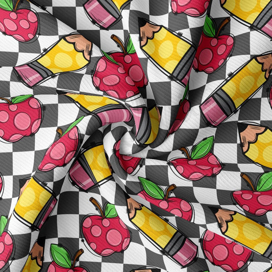 a checkered fabric with a pattern of cartoon characters