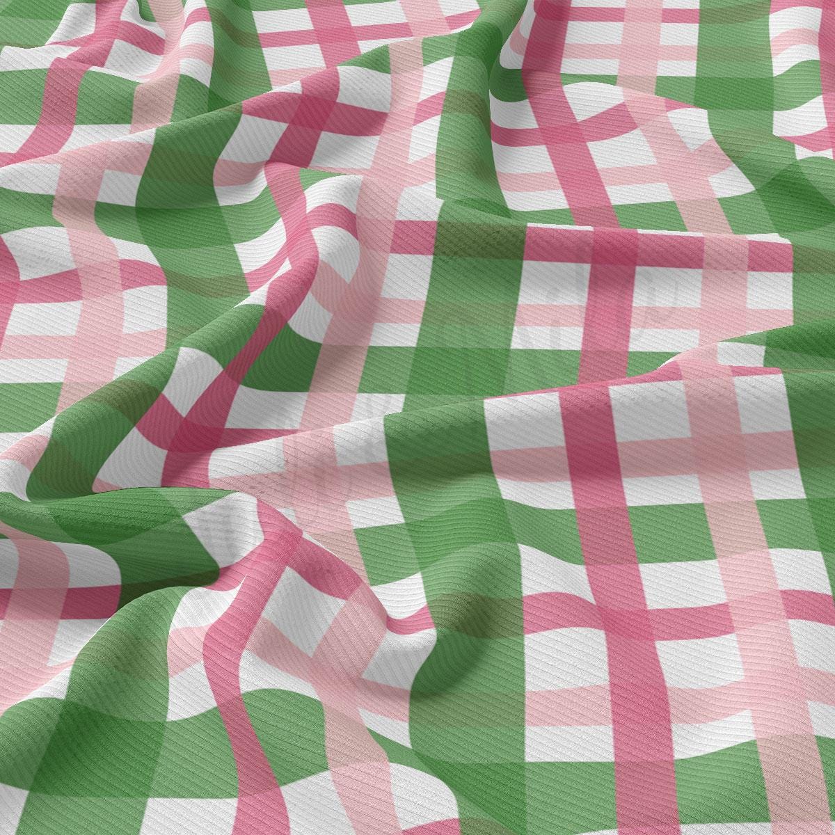 a pink and green checkered fabric is shown
