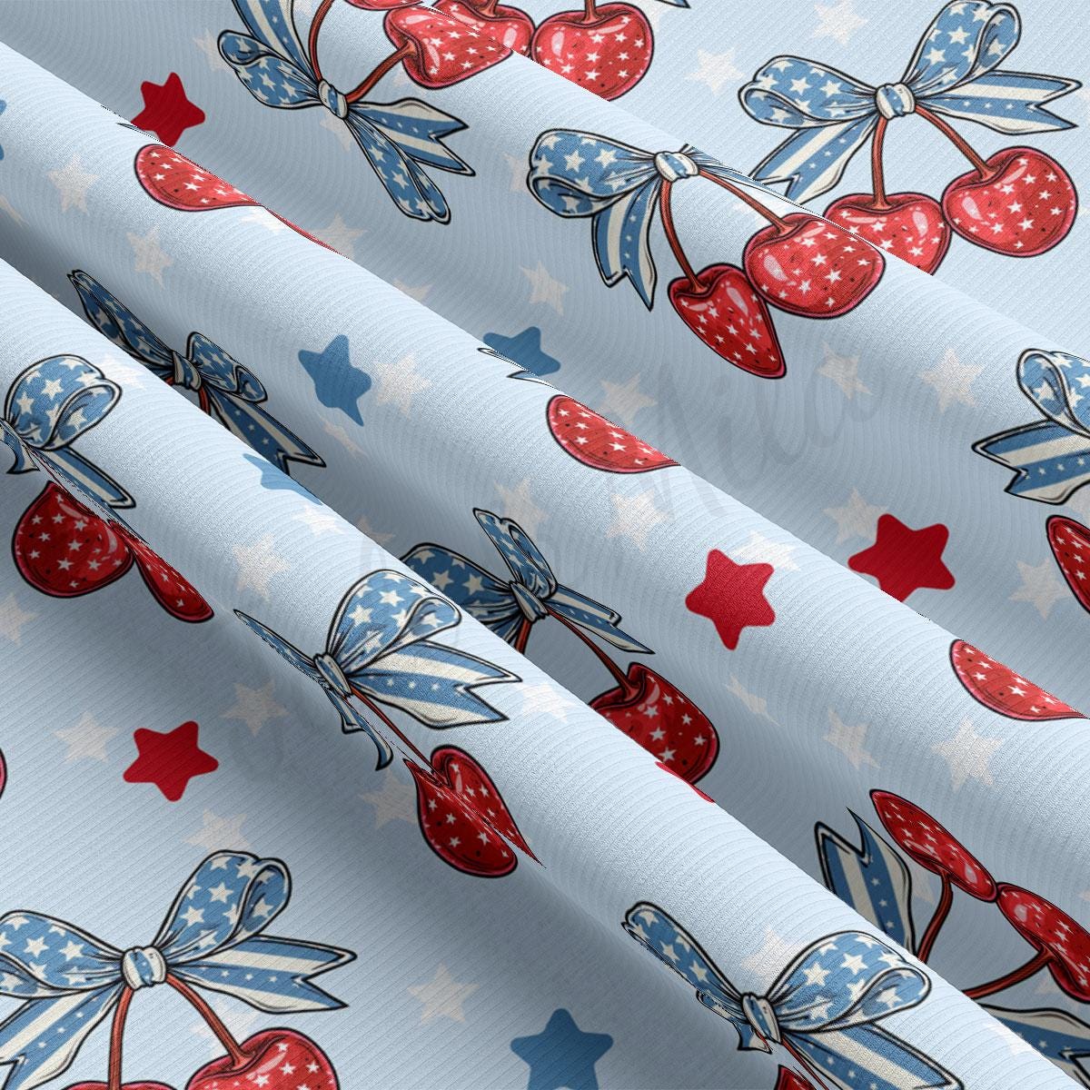 a pattern of cherries and stars on a white background