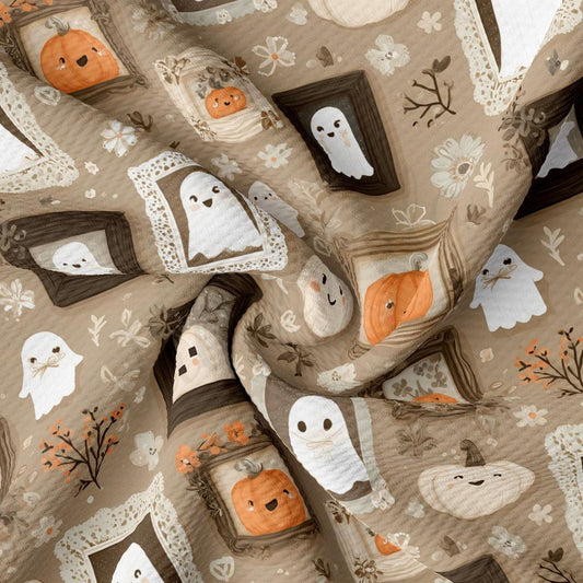The image is a close-up of a fabric with a repeating pattern of Halloween-themed elements, including ghostly figures, pumpkins, and flowers.