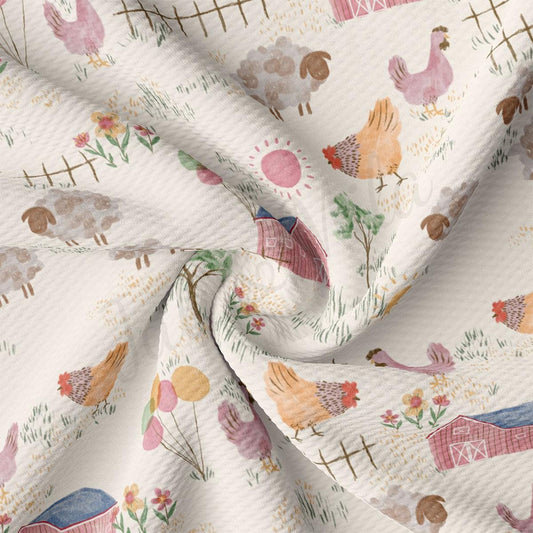 a white fabric with farm animals on it