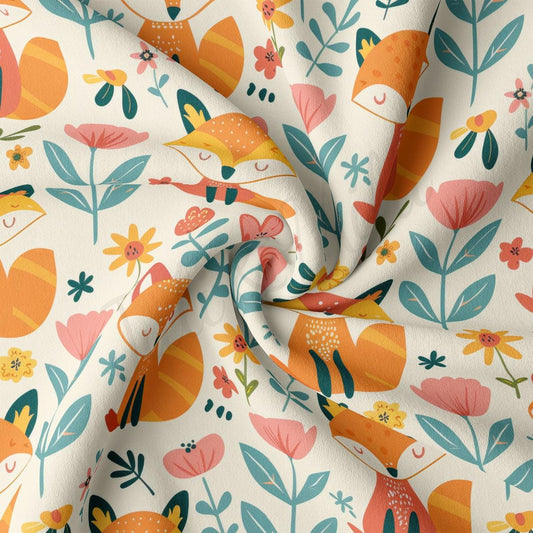 a close up of a fabric with flowers and leaves on it