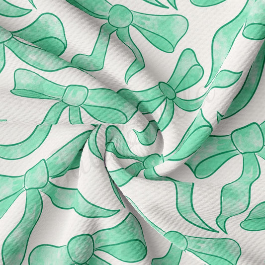 a close up of a green and white fabric