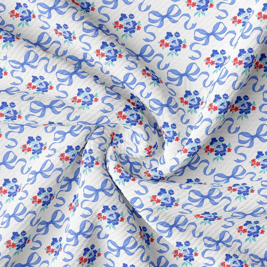 a blue and red floral print on a white background