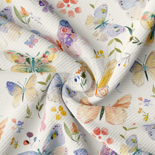 a white fabric with colorful butterflies on it