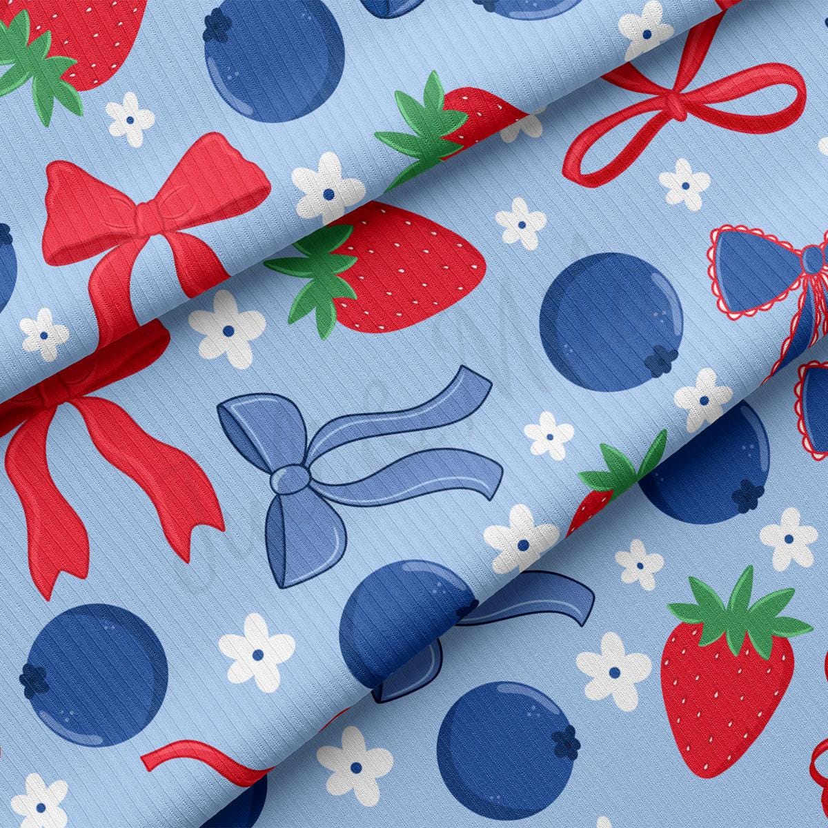a close up of a blue background with strawberries
