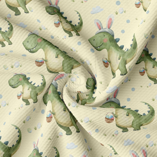 a close up of a fabric with dinosaurs on it