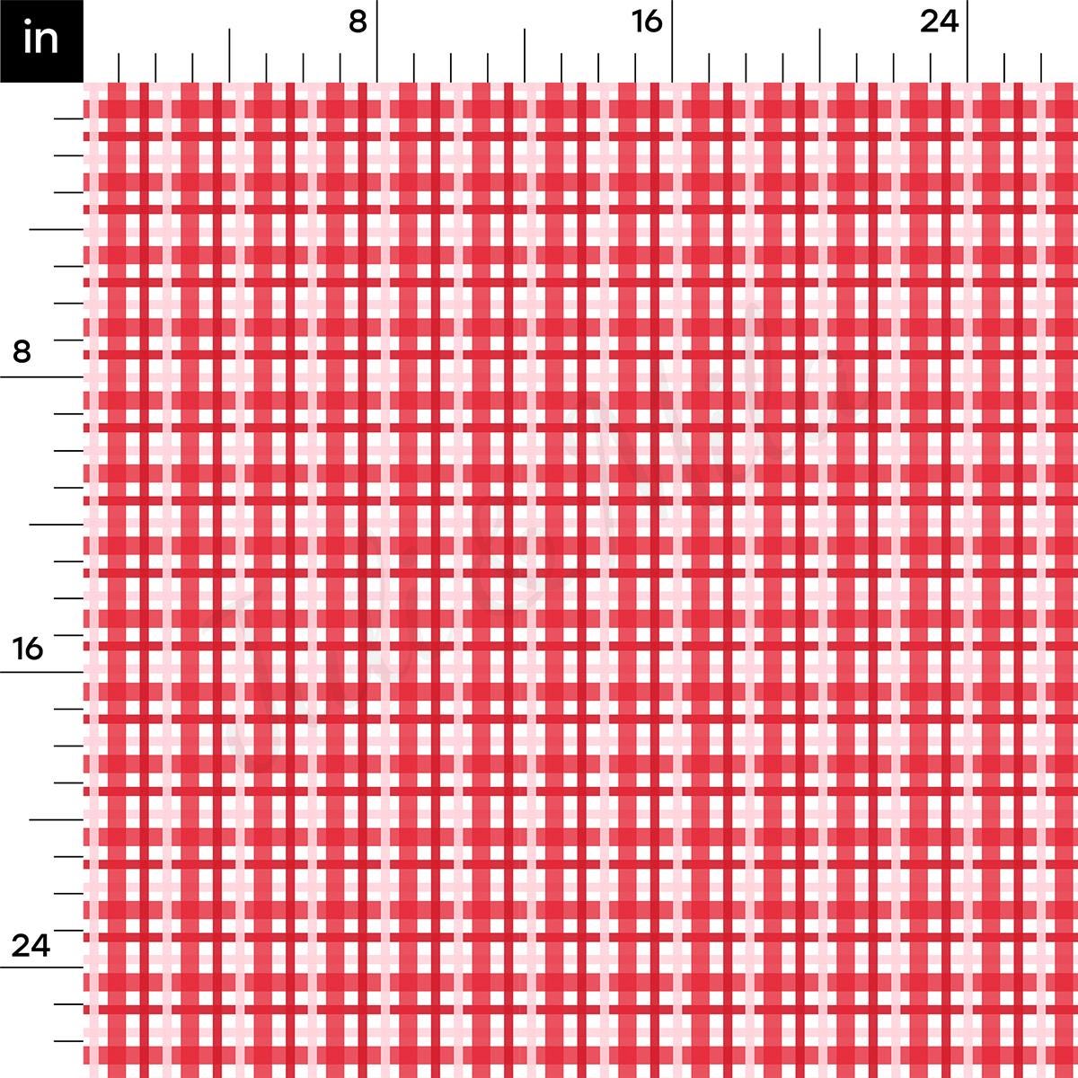 a red and white plaid pattern with a ruler