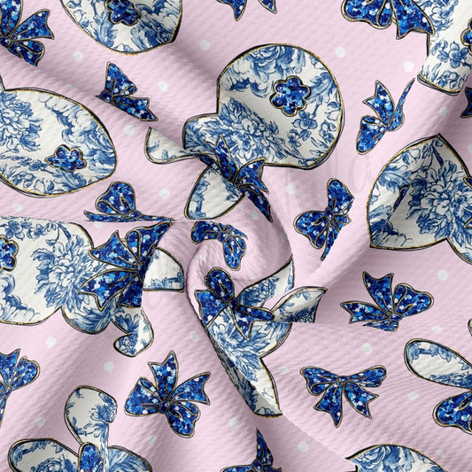 a blue and white pattern on a pink background