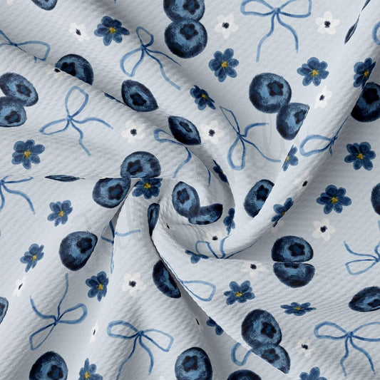 a blue and white flower print fabric