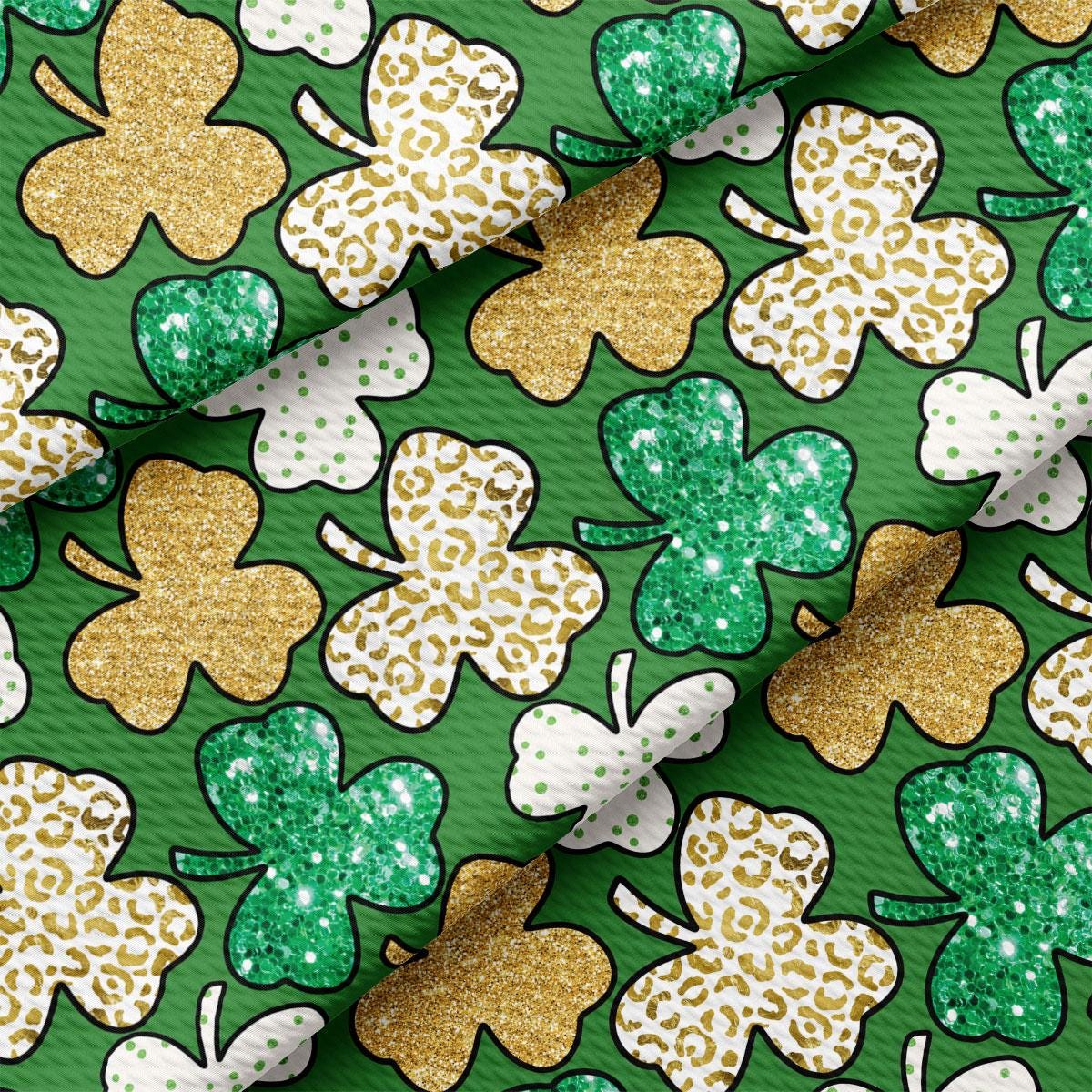 a green background with gold and white shamrocks