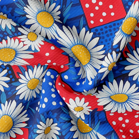 a red, white, and blue fabric with flowers on it
