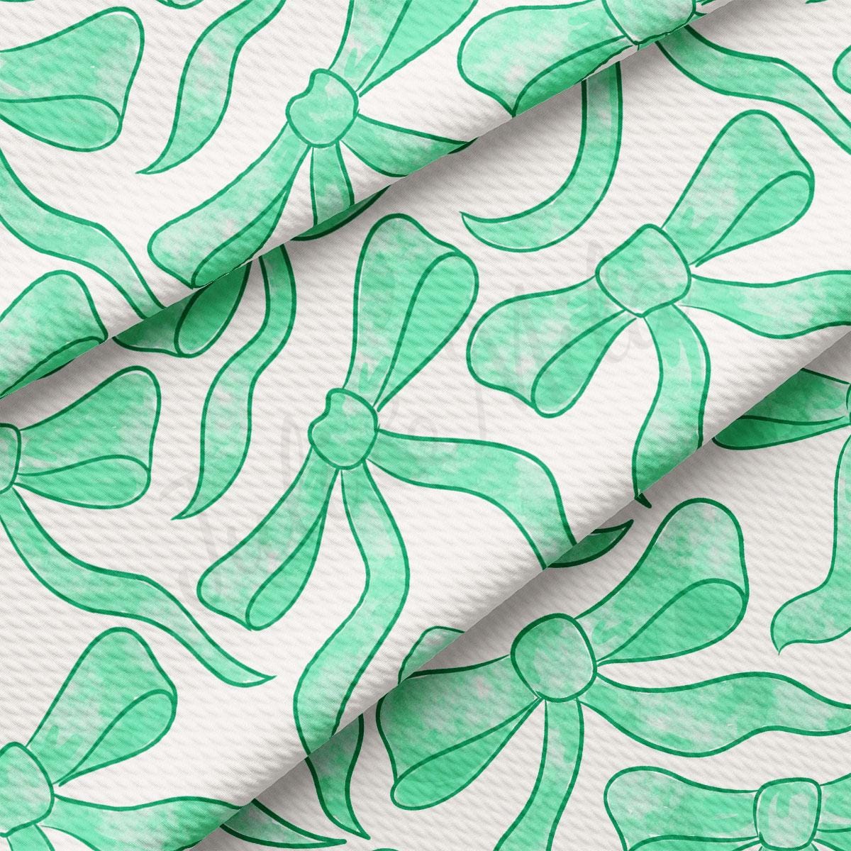 a green and white wallpaper with bows on it