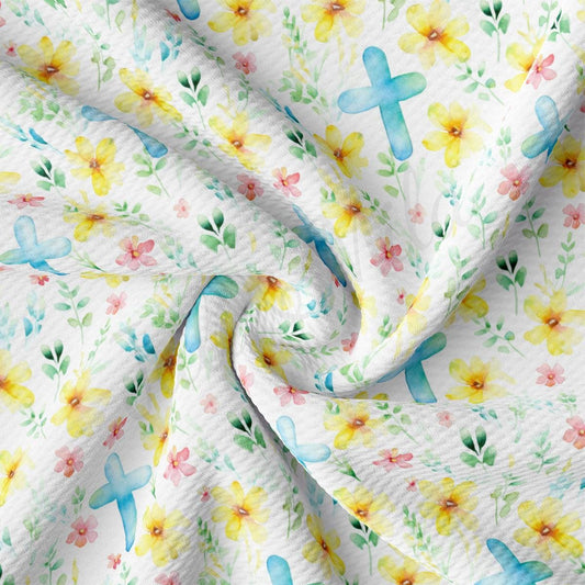 a close up of a white fabric with flowers on it