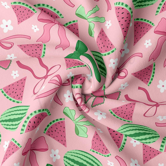 a pink background with watermelon slices and flowers