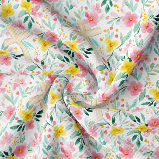 a floral print fabric with yellow and pink flowers