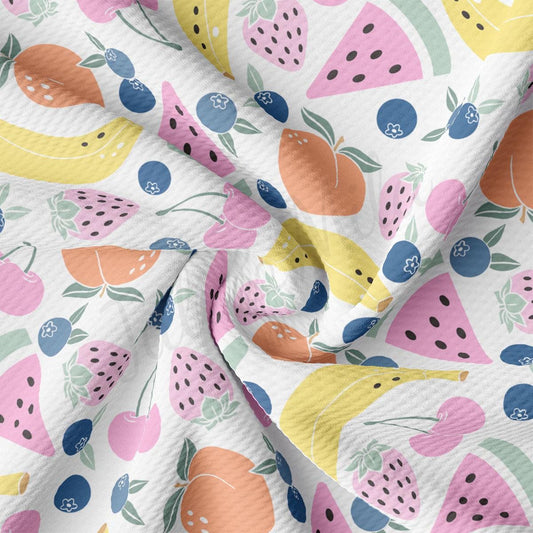 a close up of a pattern of fruit on a white background