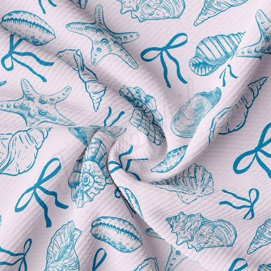 a close up of a blue and white fabric