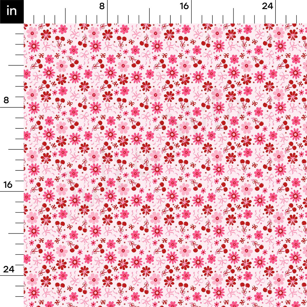 a pink and red flower pattern on a ruler