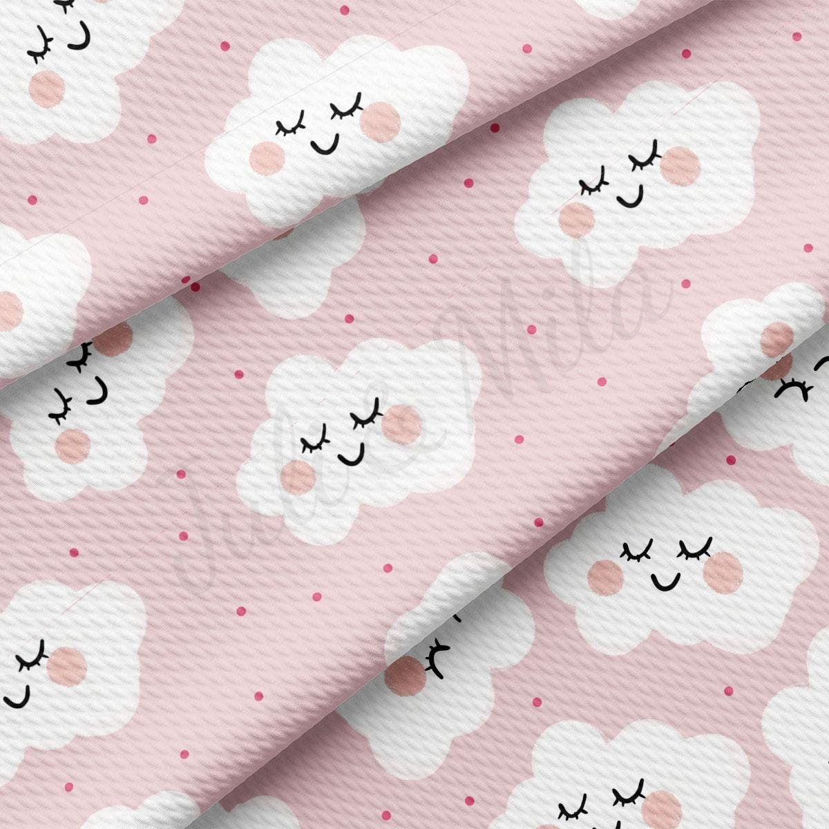 a pink background with white clouds and pink dots