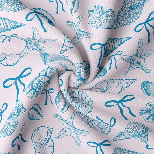 a close up of a blue and white fabric