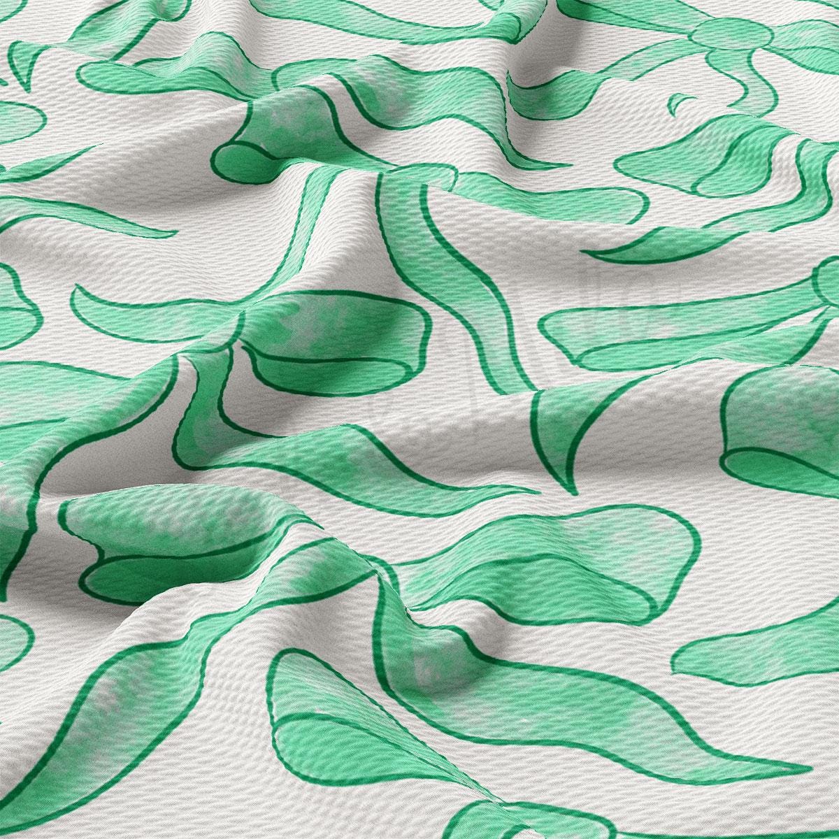 a close up of a green and white fabric