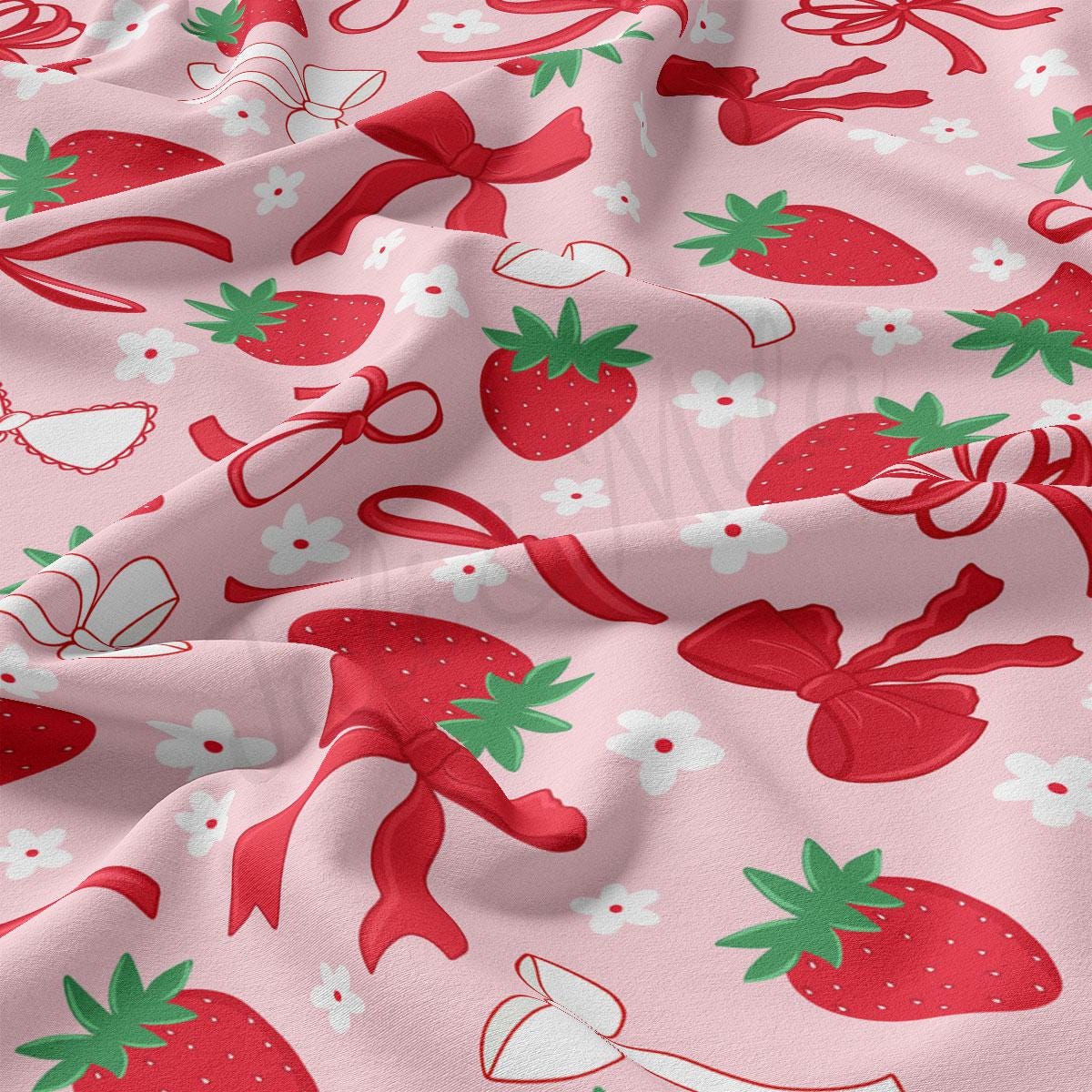 a close up of a pink fabric with strawberries on it