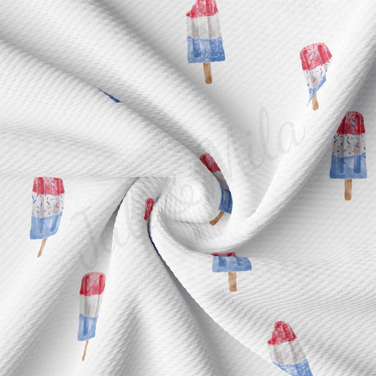 a white fabric with popsicles on it