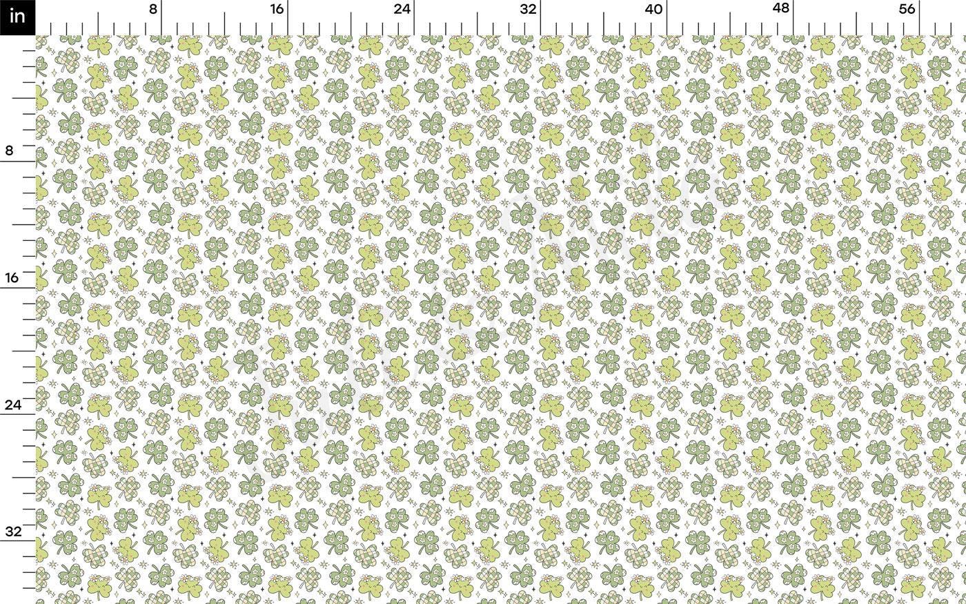 a ruler with a green and white pattern on it