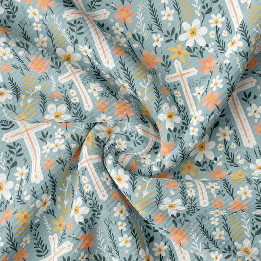 a fabric with flowers and crosses on it