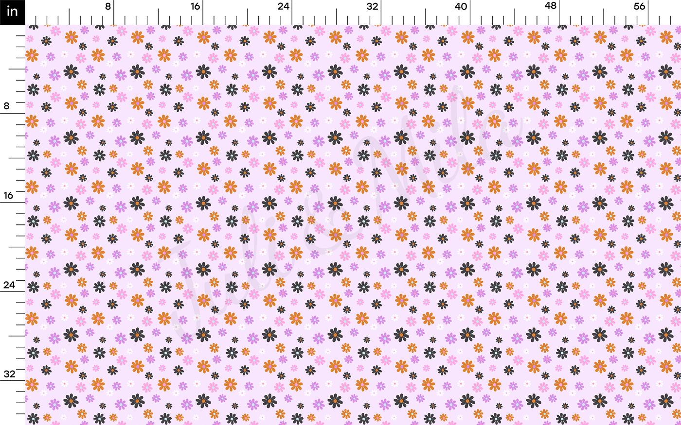 a ruler with a pattern of flowers on it