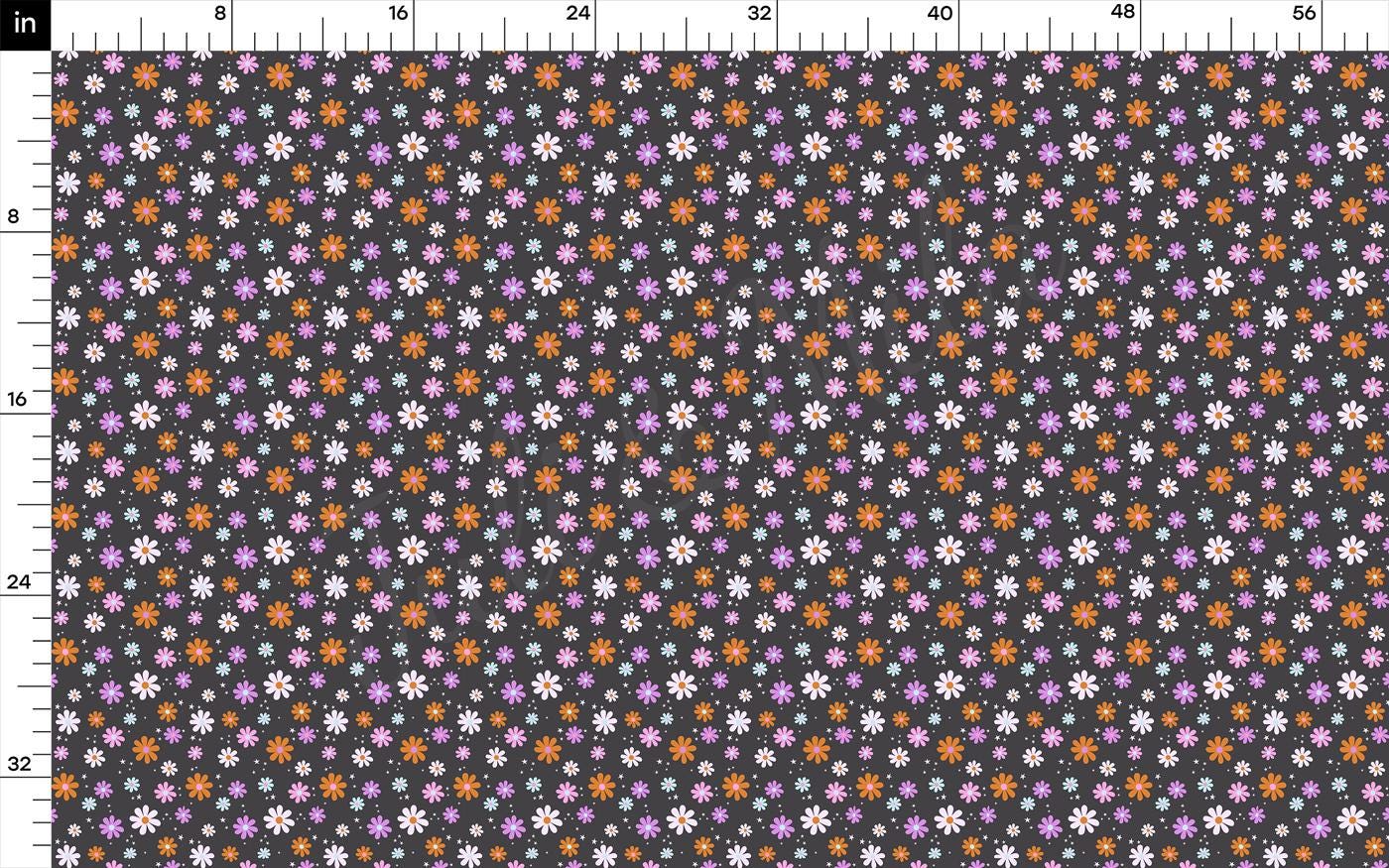 a ruler with a flower pattern on it