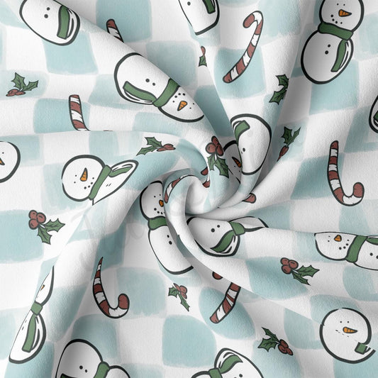 a close up of a snowman print fabric