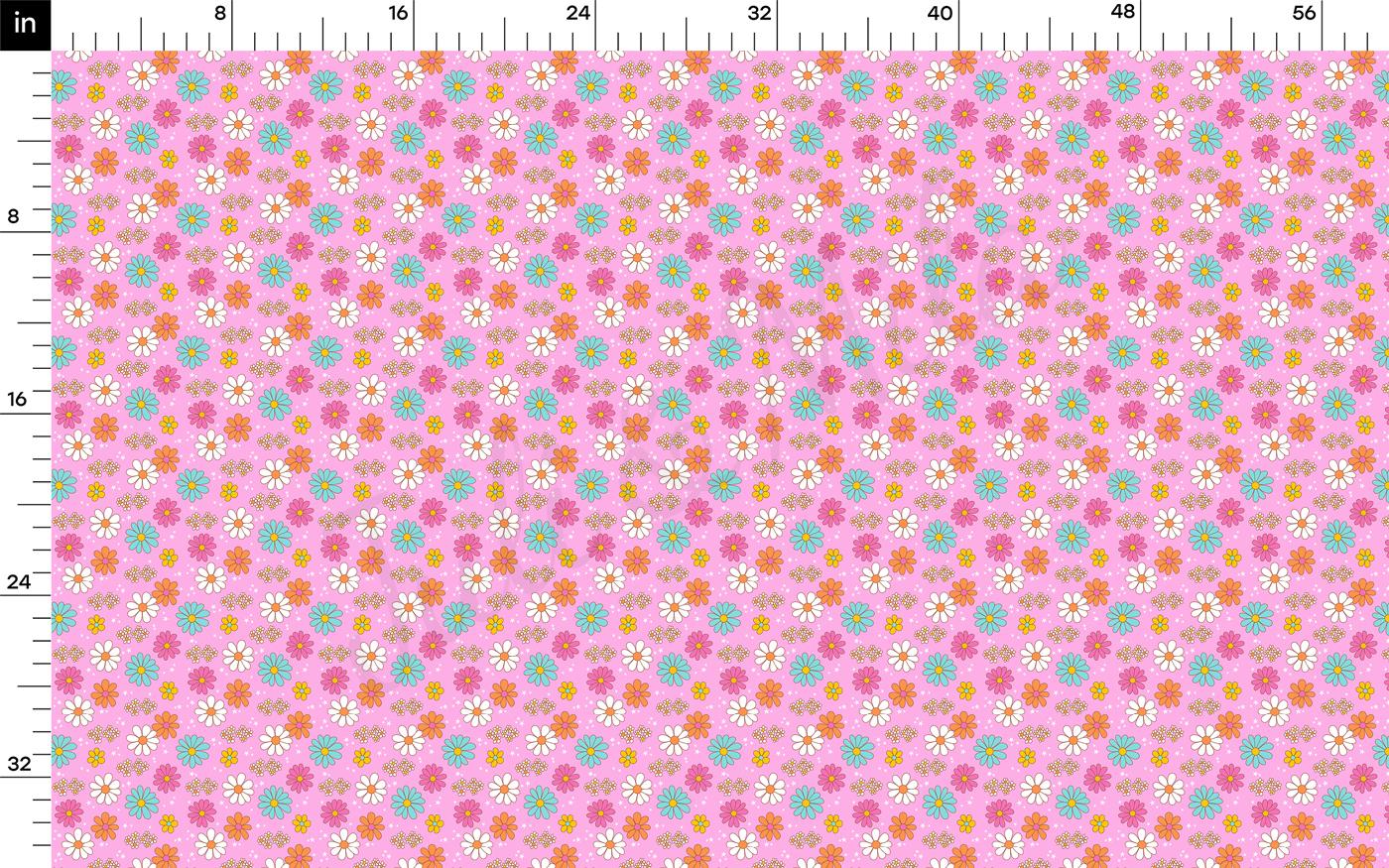a ruler with a pink and blue flower pattern on it