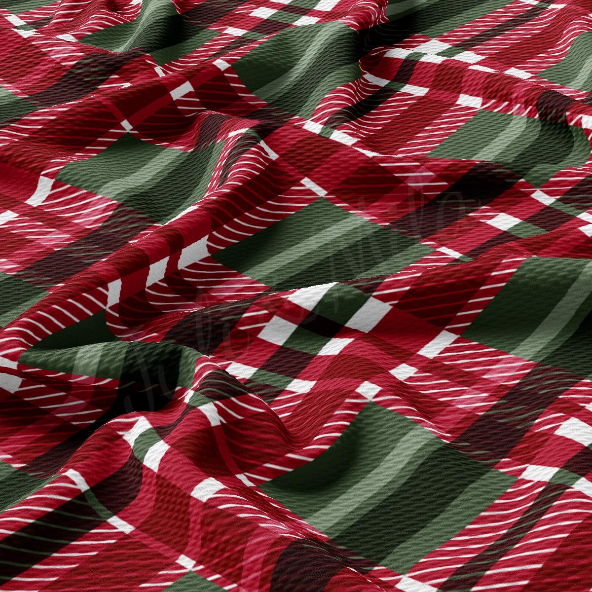 a close up of a red and green plaid fabric