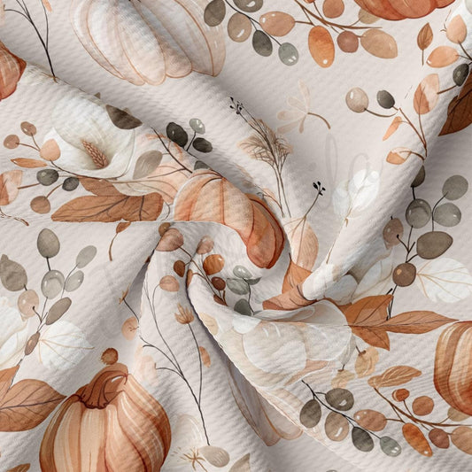 a close up of a white fabric with a flower pattern