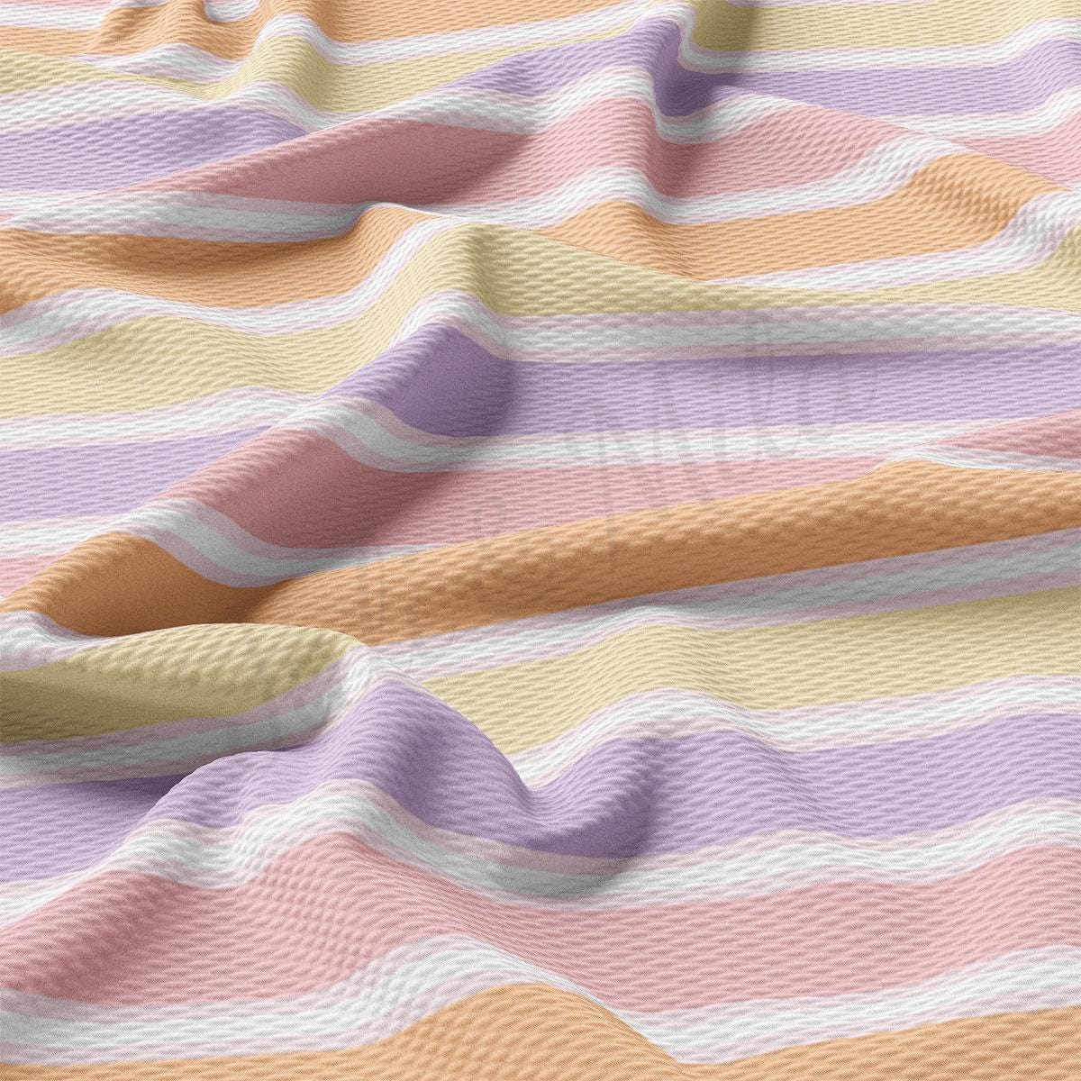 a multicolored blanket with a wavy pattern