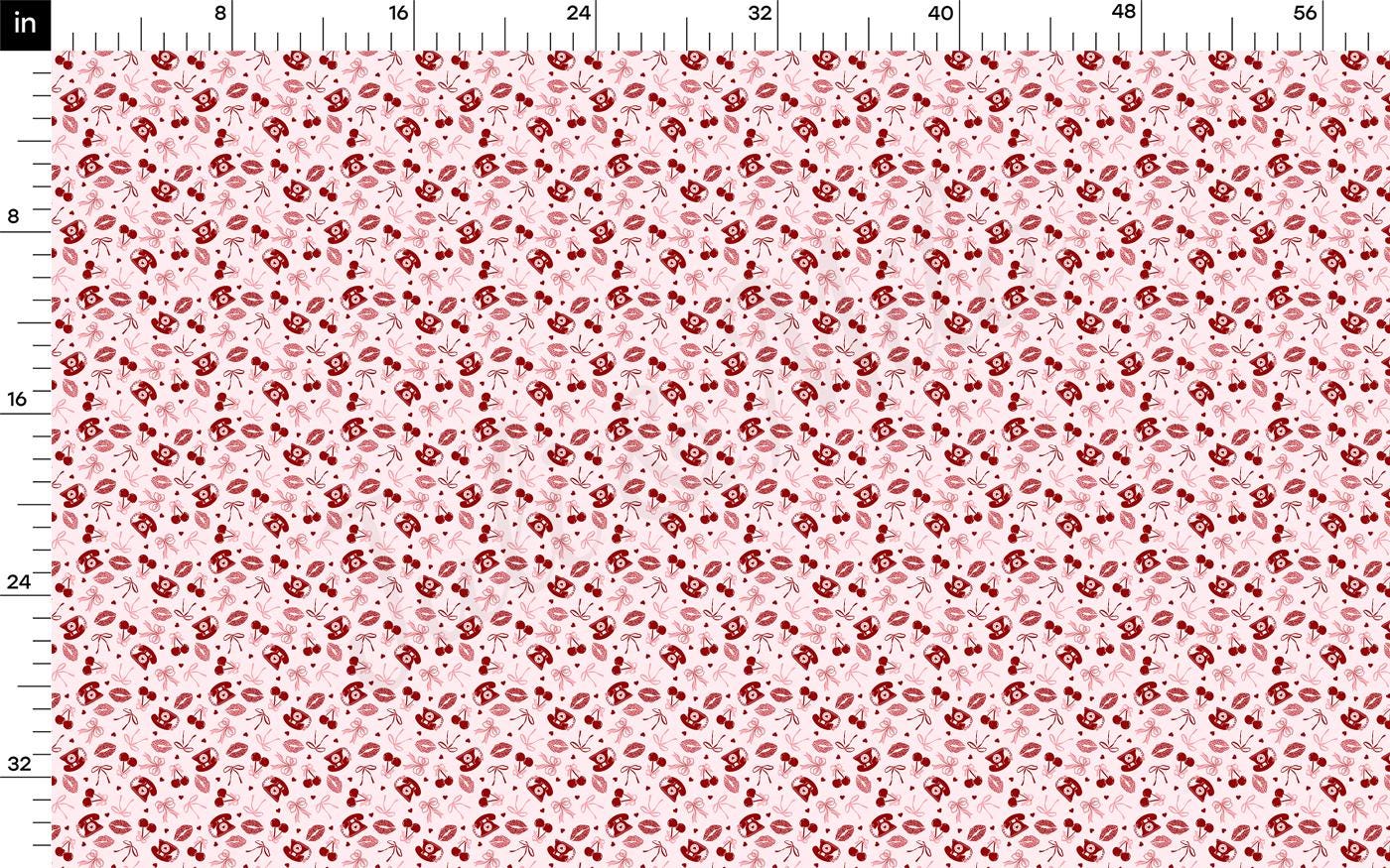 a red and white floral pattern on a ruler